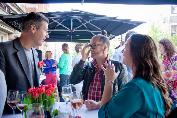 TEDxAmsterdam Community on a sunny afternoon at the balcony of the Stadsschouwburg in Amsterdam.